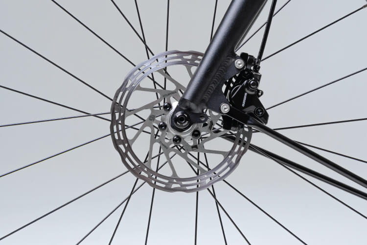 Shimano hydraulic brakes, Schwalbe tyres.